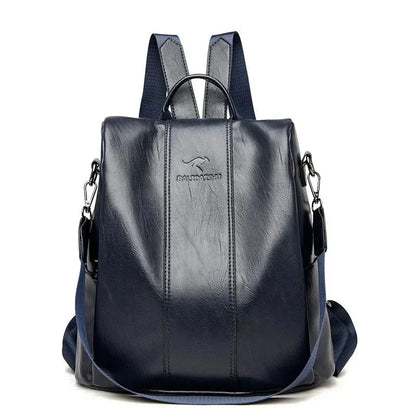  A stylish women's backpack with a sleek design, featuring a sturdy handle, adjustable shoulder straps, and side hooks for versatile carrying options. The bag has a smooth finish and a spacious main compartment, ideal for everyday use or travel.