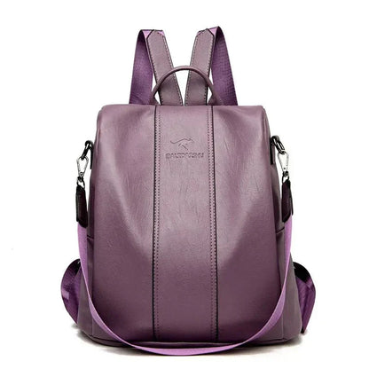  A stylish women's backpack with a sleek design, featuring a sturdy handle, adjustable shoulder straps, and side hooks for versatile carrying options. The bag has a smooth finish and a spacious main compartment, ideal for everyday use or travel.
