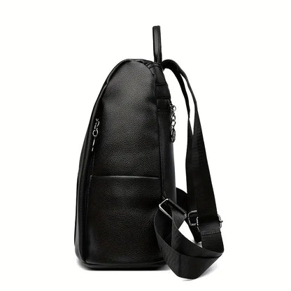  A stylish women's backpack with a sleek design, featuring a sturdy handle, adjustable shoulder straps, and side hooks for versatile carrying options. The bag has a smooth finish and a spacious main compartment, ideal for everyday use or travel.